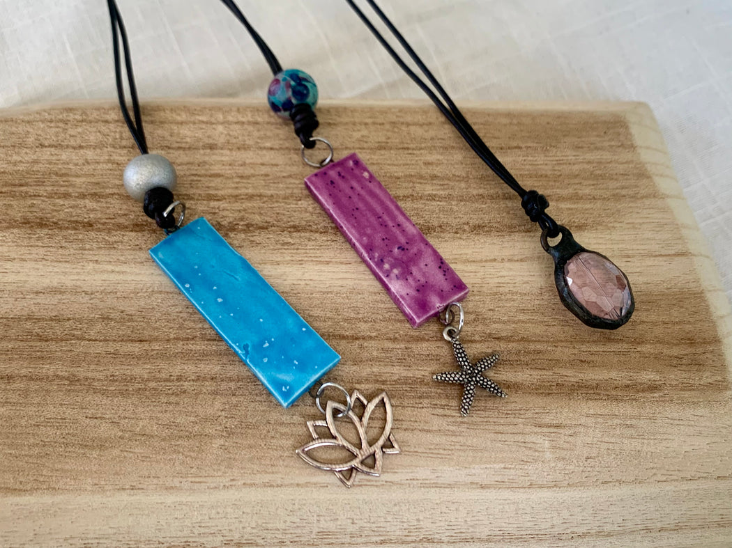 Lotus, Starfish, and Crystal Necklaces